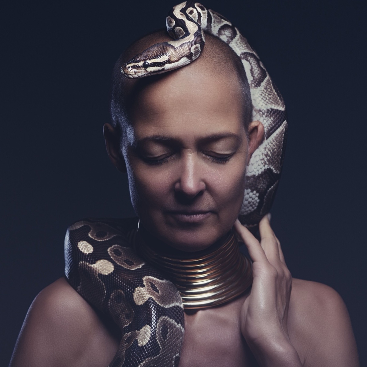 Creative portrait with a patterned snake