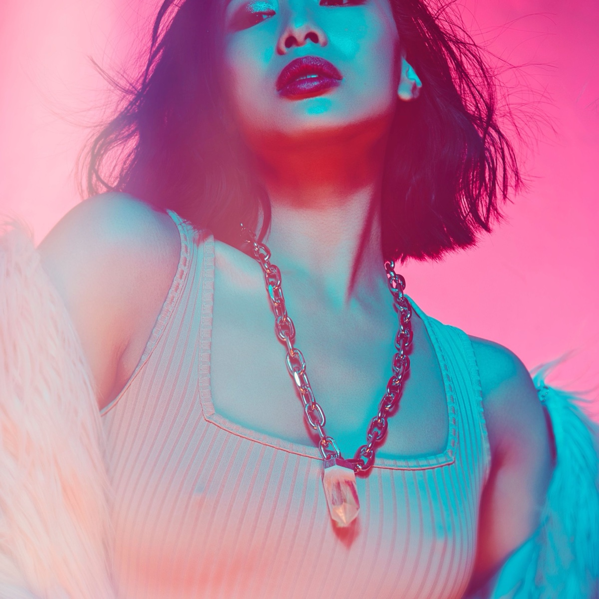 Pink and blue close-up fashion portrait