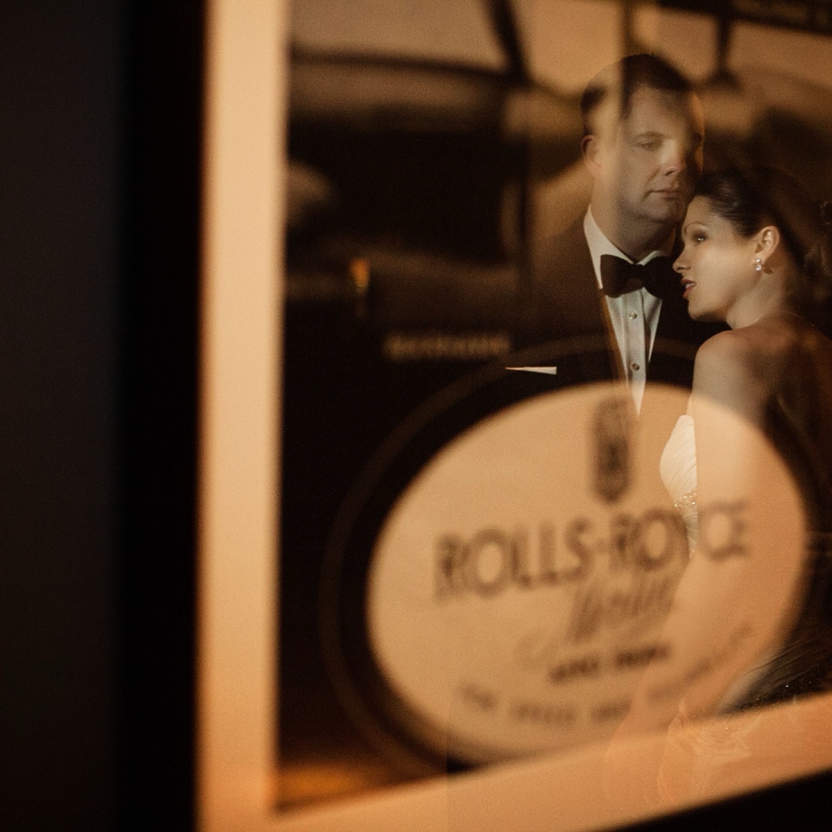 Couple reflected in a vintage mirror at Aviator Hotel