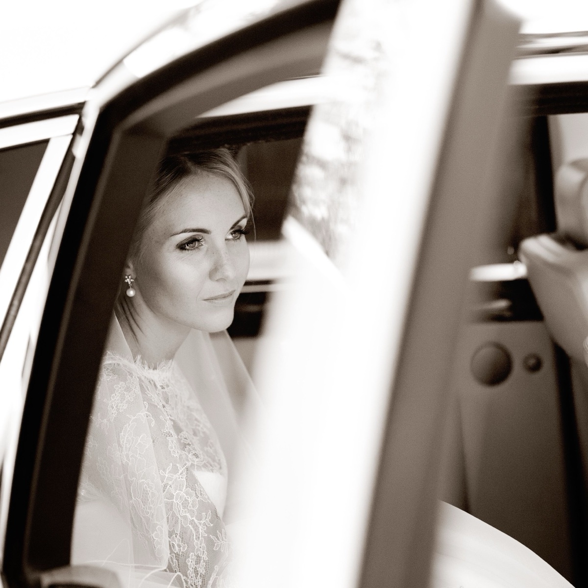 Bride inside a wedding car at Claridge's