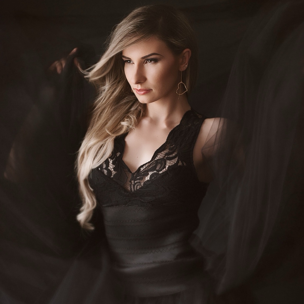 Elegant fashion portrait on a dark background