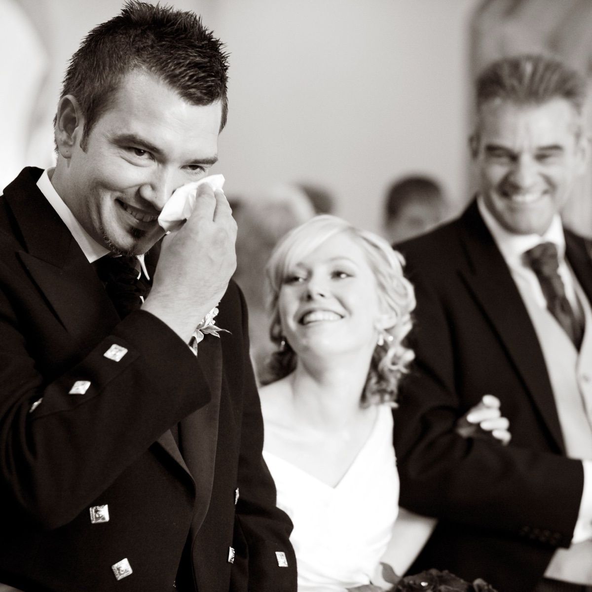 Groom overcome with emotion as he sees the bride