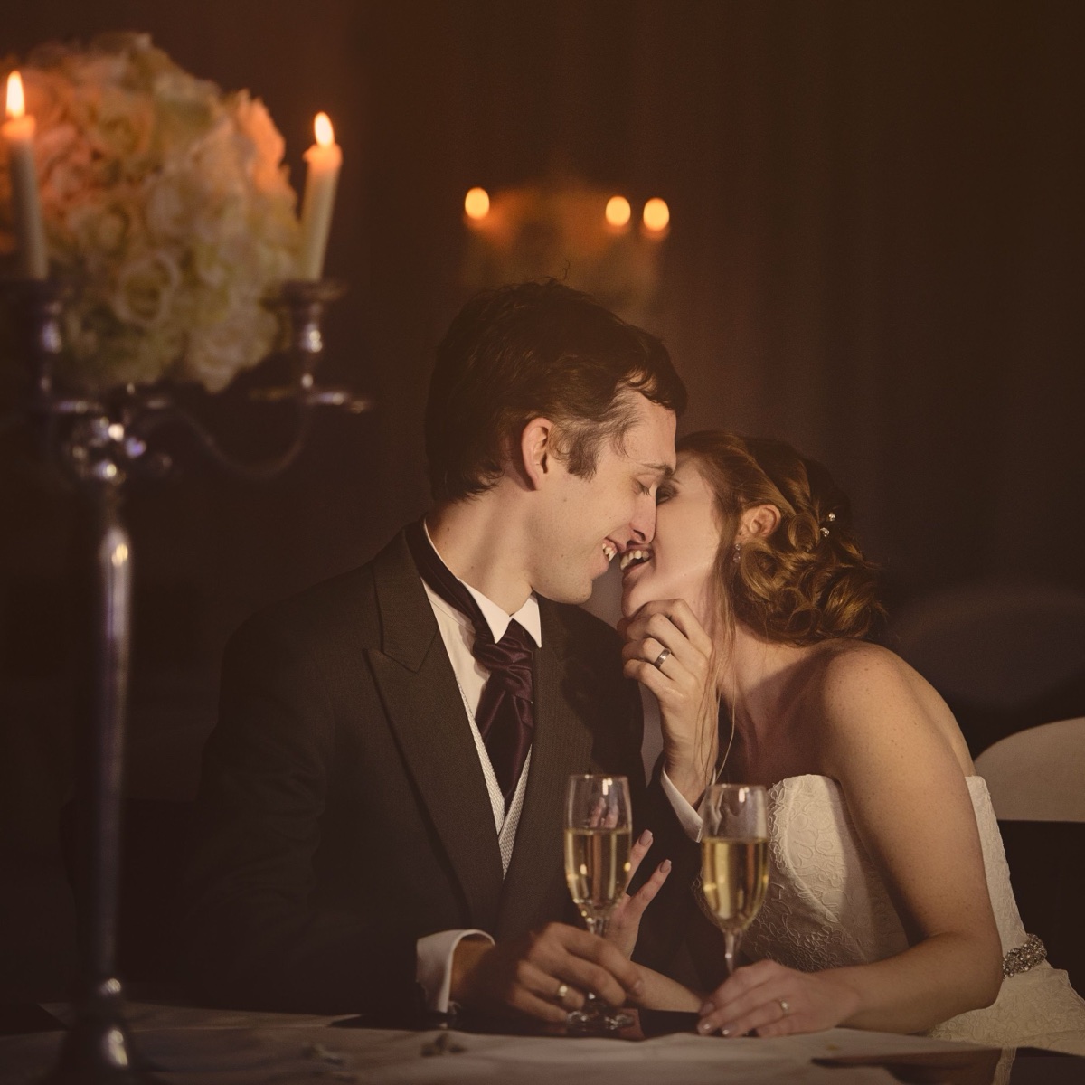 Newlyweds sharing a quiet moment at their reception