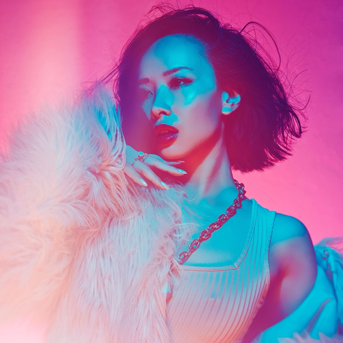Vivid pink and blue editorial portrait