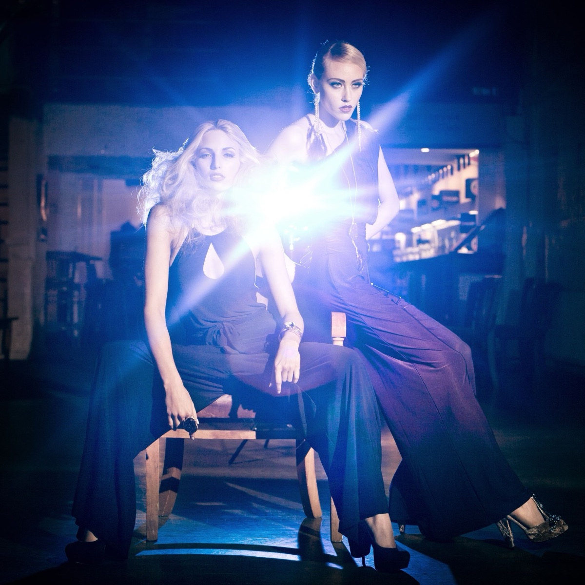 Two fashion models in blue evening light