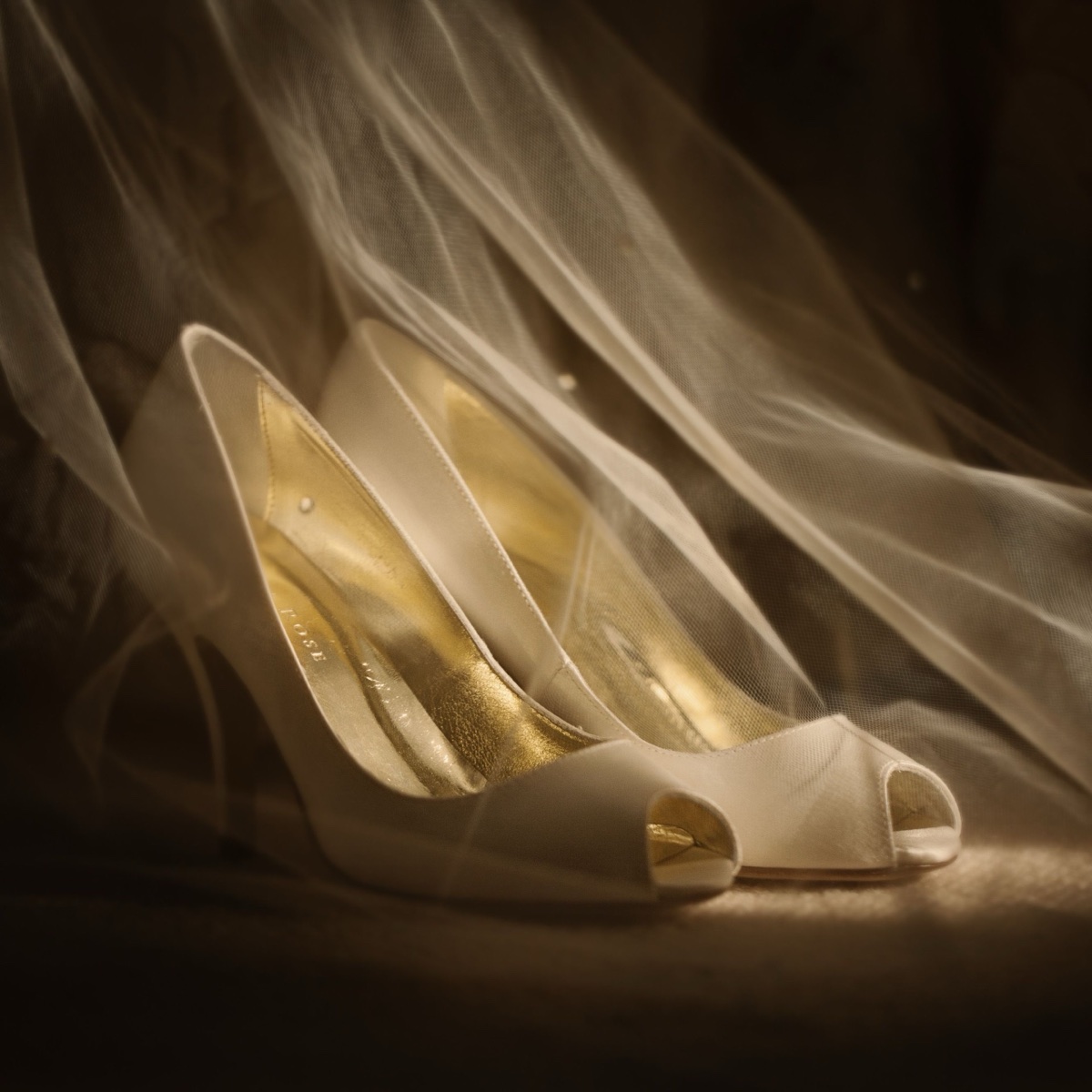 Bride's shoes at Pennyhill Park in Surrey